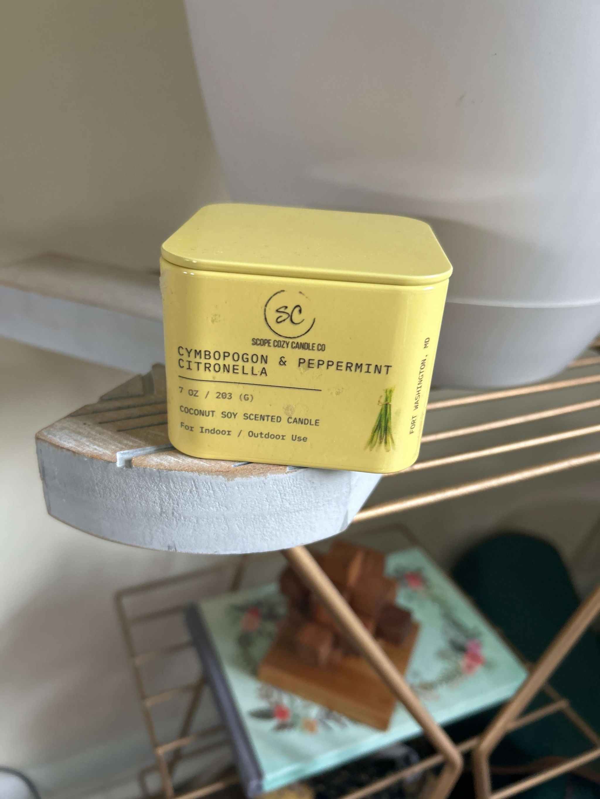 Yellow 7oz Cymbopogon & Peppermint Citronella scented candle in a square tin container