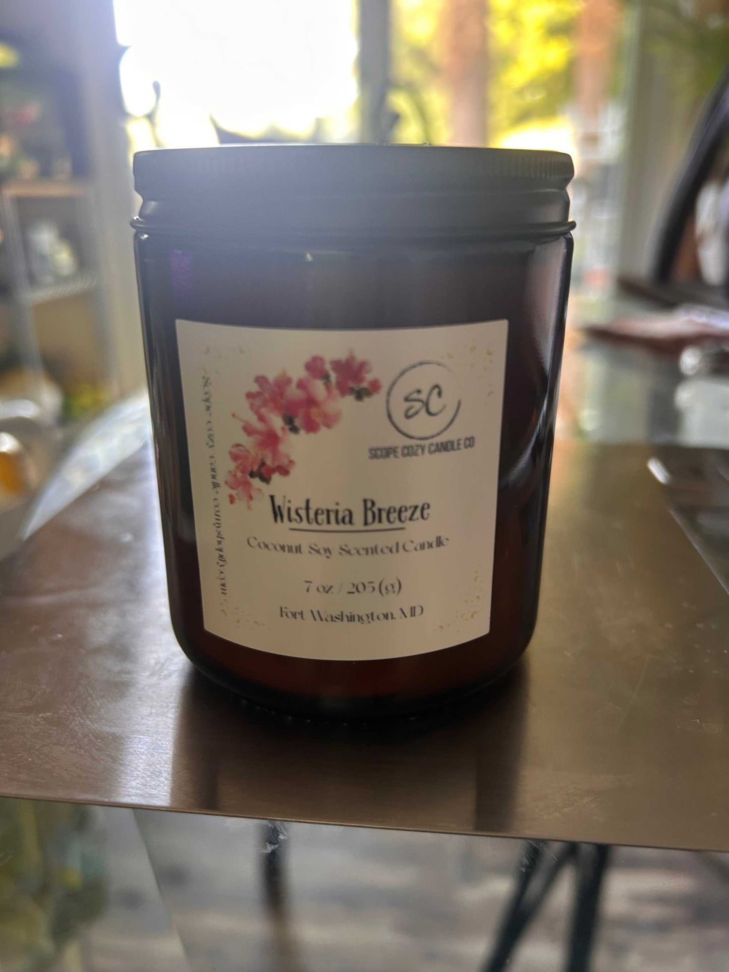 Wisteria Breeze coconut soy scented candle with fresh floral and citrus aromas in a 7 oz jar