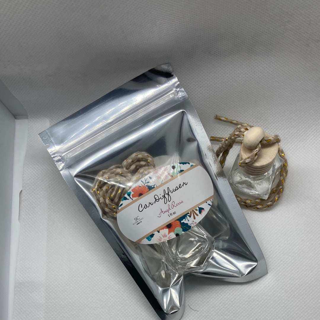 Angel Rossa car diffuser with floral and fruity tropical scent, including citrus, mango, berries, and pineapple, packaged in a silver resealable bag.