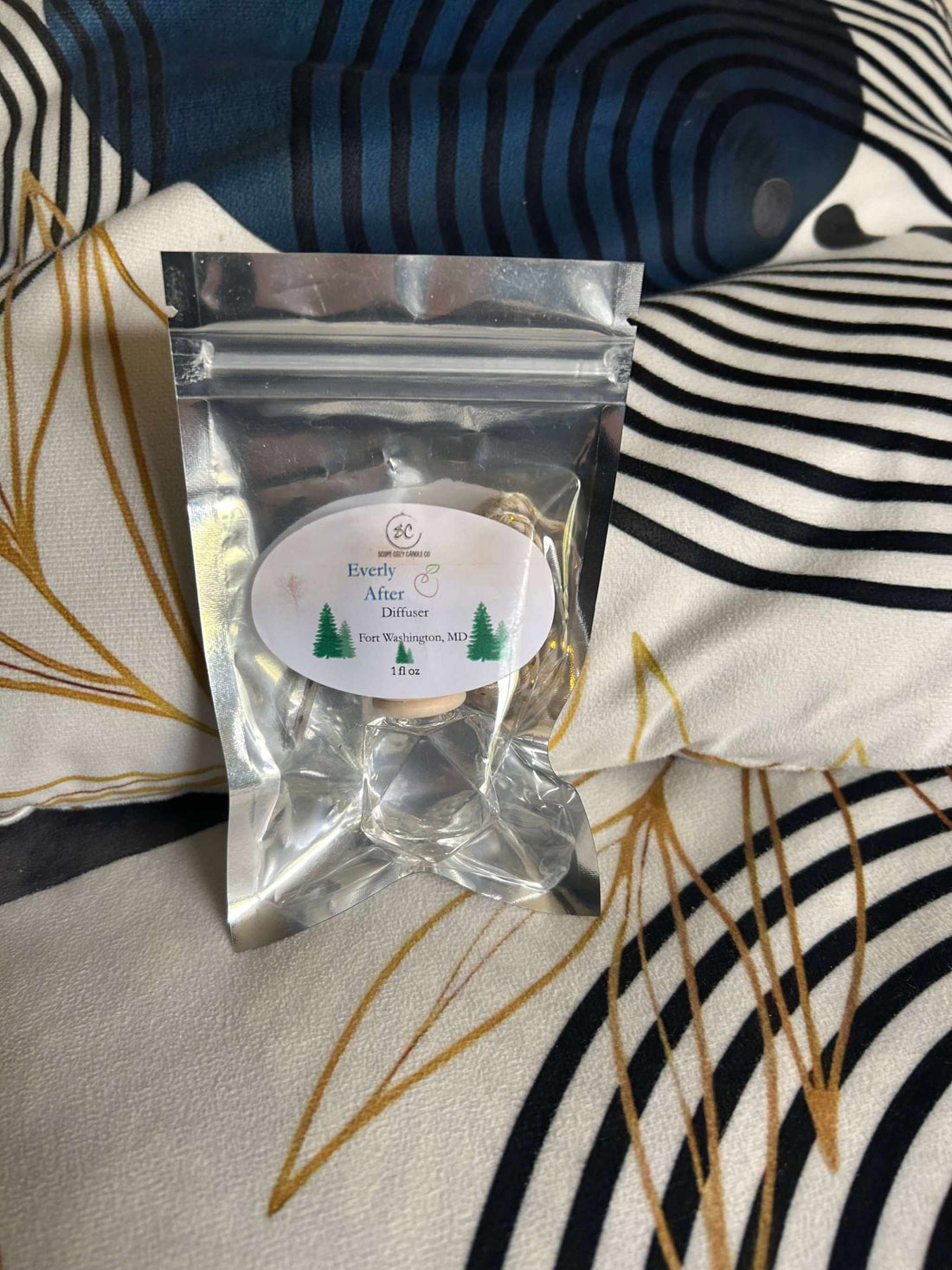 Every After Diffuser 1oz aroma diffuser with pine, cedar wood, cypress, juniper, apple, and ginger scent in clear resealable pouch