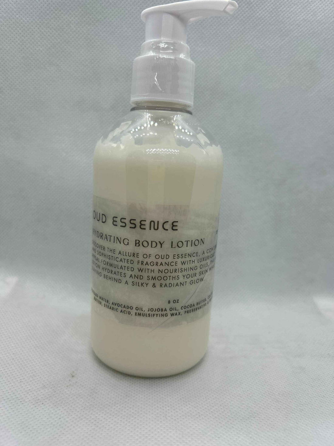 Essence Body Lotion Oud Essence hydrating lotion with avocado, jojoba oils, and cocoa butter in 8oz pump bottle
