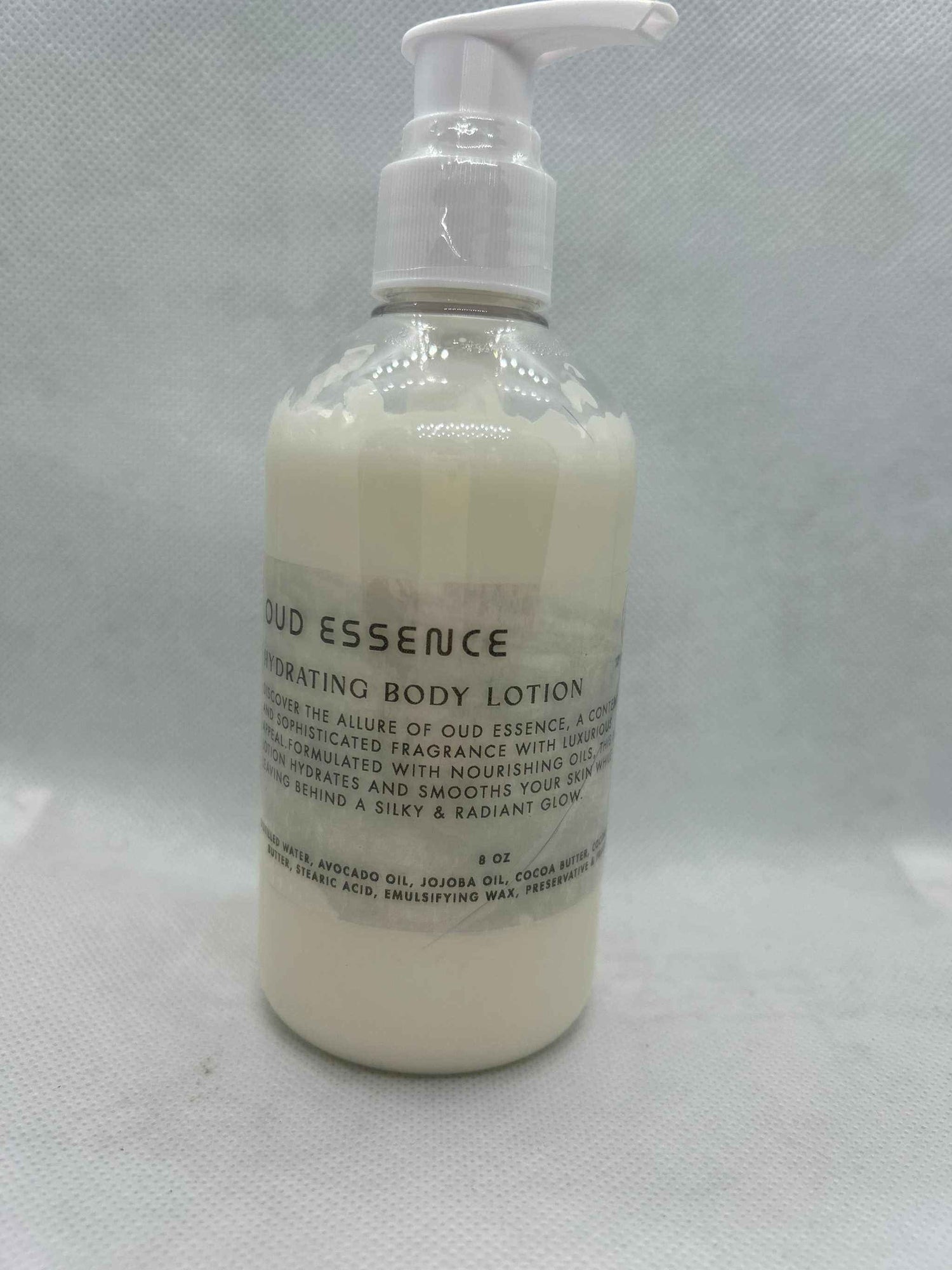 Essence Body Lotion Oud Essence hydrating lotion with avocado, jojoba oils, and cocoa butter in 8oz pump bottle