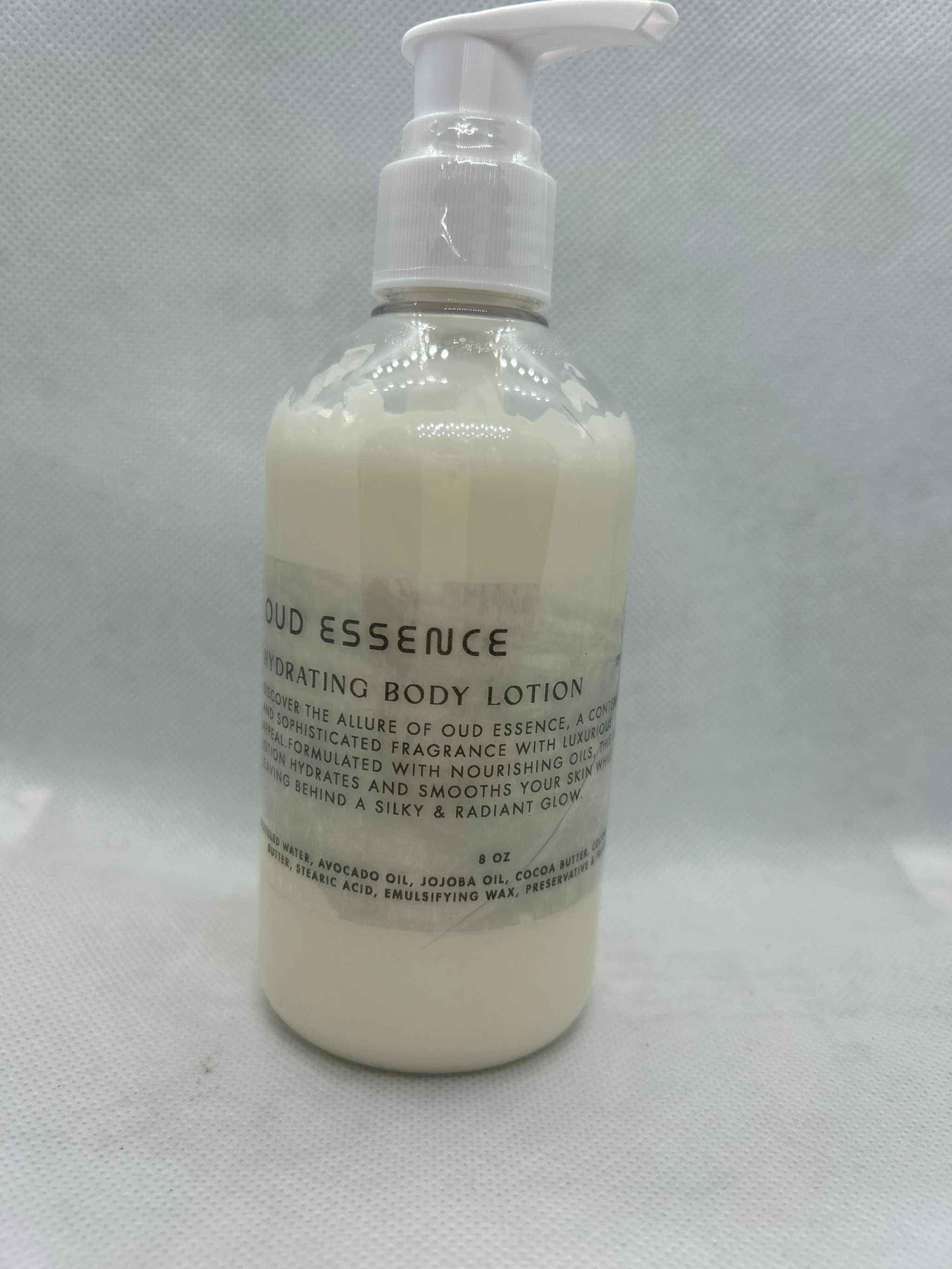 Essence Body Lotion Oud Essence hydrating lotion with avocado, jojoba oils, and cocoa butter in 8oz pump bottle