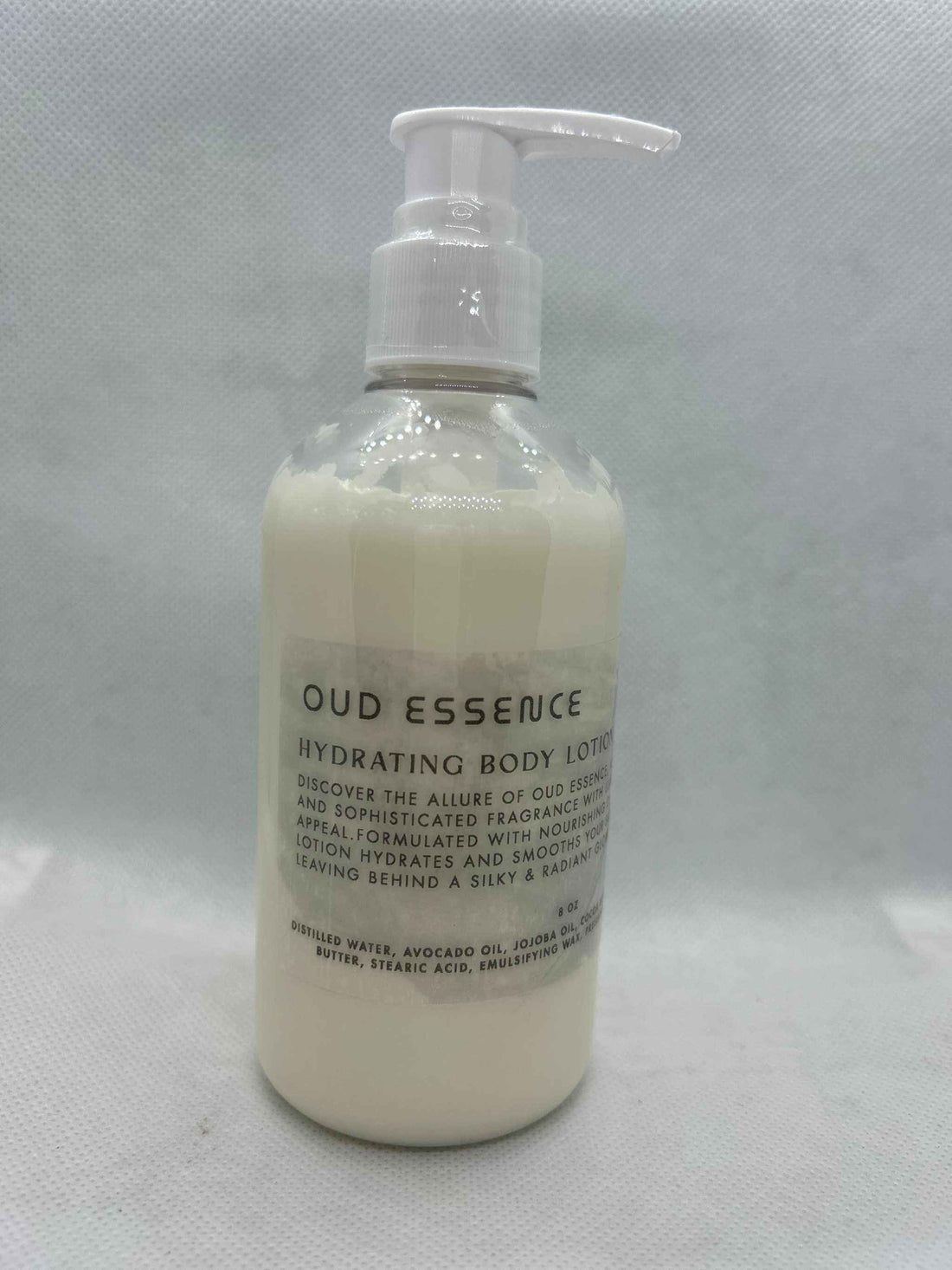 Oud Essence Hydrating Body Lotion with tonka, avocado, jojoba oils, and cocoa butter in 8oz pump bottle