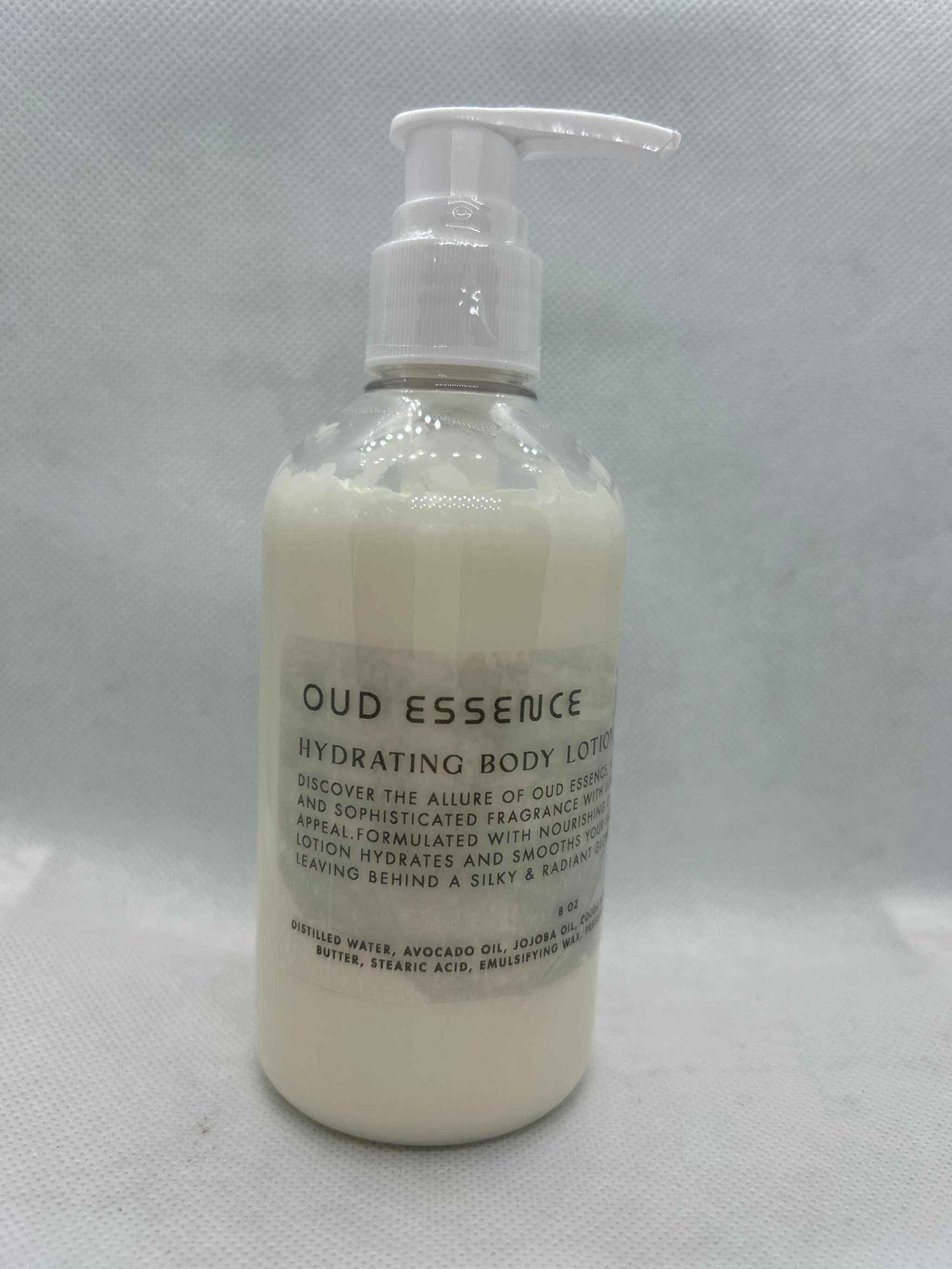 Oud Essence Hydrating Body Lotion with tonka, avocado, jojoba oils, and cocoa butter in 8oz pump bottle