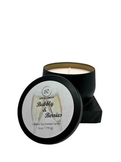 Bubbly &amp; Berries 6oz coconut soy wax candle with strawberry and champagne scent in black container with lid.