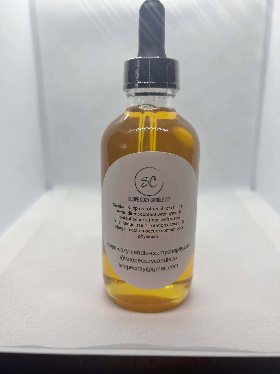 Desert Oasis Body Oil 4oz in clear bottle with dropper, hydrating floral and cactus scent.