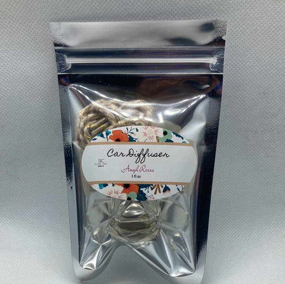 Angel Rossa car diffuser with tropical fruity floral scent in resealable silver pouch