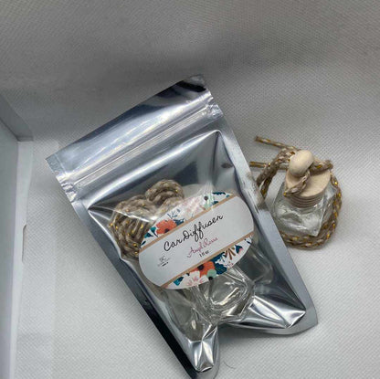 Angel Rossa car diffuser with floral and fruity tropical scent, including citrus, mango, berries, and pineapple, packaged in a silver resealable bag.